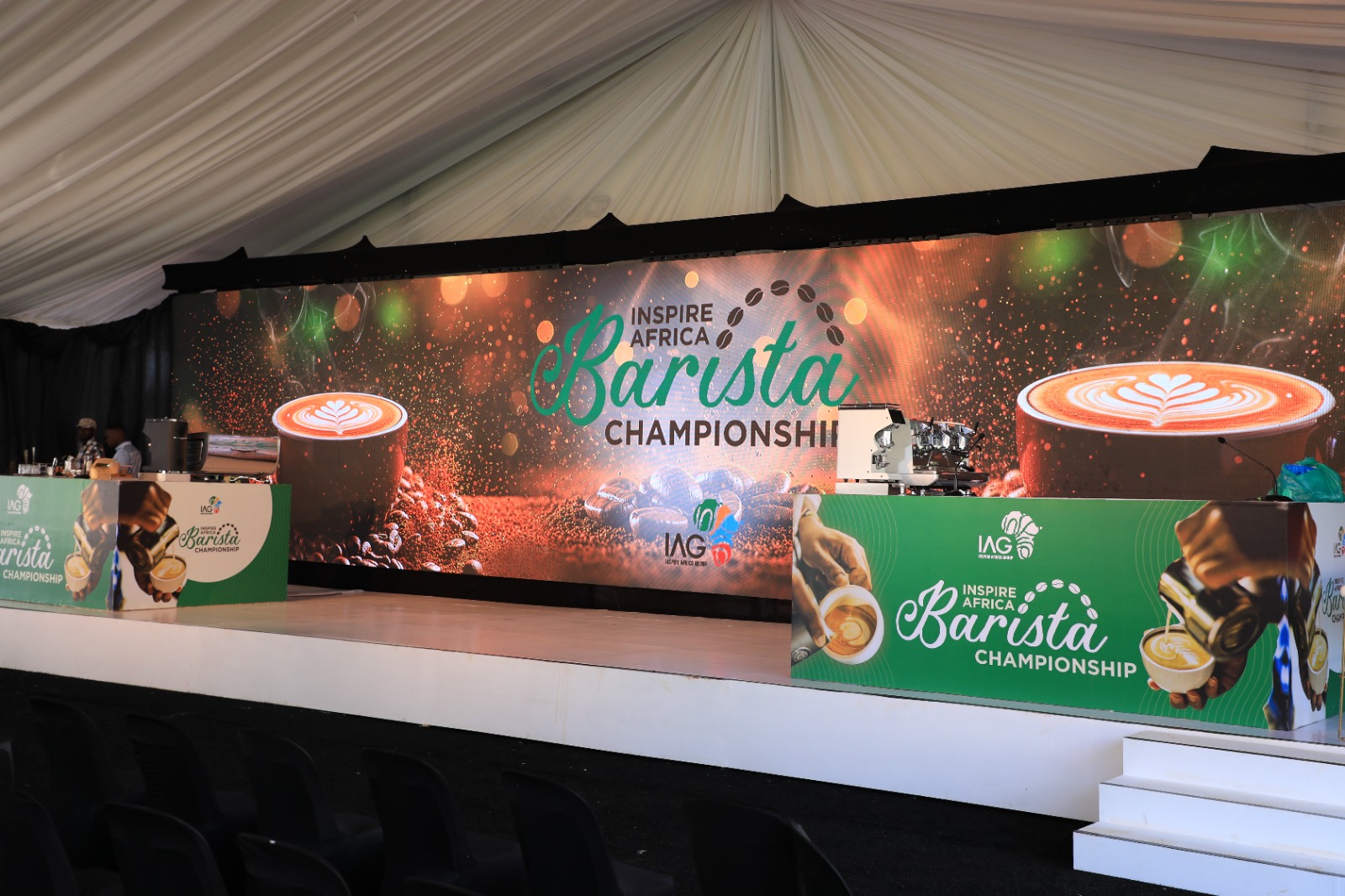 Inspire Africa Barista Championship main stage with speaker and espresso bar